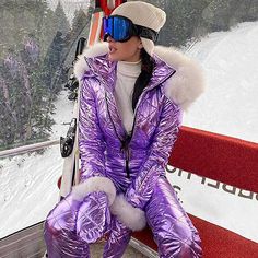 Material: Polyester, Filler: white duck down, feathers, Cotton. One-Pieces ski jumpsuit with belt: Whole body covered, Fully sealed seams ensure no wind and water permeates into layers, keep you warm in winter, snow day, skiing. Feature: Zipper closure makes it easy to wear and dress quickly, The belt design makes you