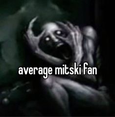 the words average misti fan are in front of an image of a creepy creature