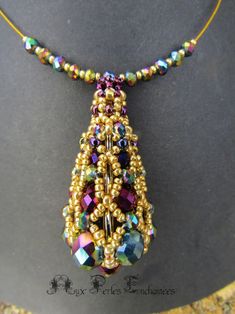 a beaded necklace is displayed on a mannequin