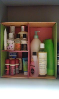 a shelf filled with lots of different types of soaps and lotion bottles next to each other