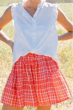 The perfect Americana shorts are here, to wear to EVERY Holiday this Spring/Summer! - Flowy short that feature a ruffle detail at the side and a red and white check print through out with a tie waist - Fit true to size - Model is in a size Medium - Fabric: 100% Polyester - Paired with our Lake Daze Crop Tee * due to screens and filters colors may vary slightly to photos * Spring Short Length Tops With Elastic Waistband, Spring Tops With Elastic Waistband, Short Length, Spring Tops With Elastic Waistband And Short Length, Summer Cotton Ruffle Shorts, Ruffled Cotton Shorts For Summer, Fitted Elastic Waistband Shorts For Summer, Summer Cotton Shorts With Ruffles, Red Ruffled Shorts For Spring, Red Tops For Day Out