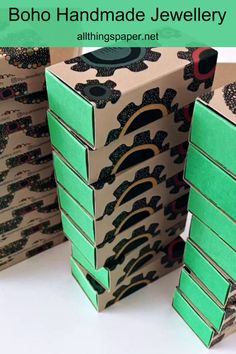 stacks of small folded paper boxes with printed gear design on cover. Boho Handmade, Handmade Boho, Packaging