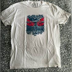 Brand New Without Tags Quiksilver Sound Of Surf Volcano Men’s Size Xl. Surfing Tshirts Vintage, Vintage Surf Style, Surf Festival, Casual Surfing T-shirt With Graphic Print, Surf Style Men, Vintage Quiksilver, Surfing Graphic Print Relaxed Fit T-shirt, Graphic Tee Soft-washed T-shirt For Surfing, Surf Tee