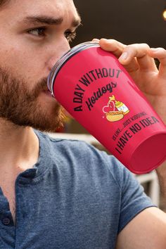 a man drinking from a red cup with the words, don't without hotdogs on it