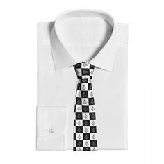 This Master Mason Blue Lodge Necktie is made from high-quality polyester material ensuring that the tie is easy to care for. This necktie features a printed timeless white and black checkered Pattern. It is Designed with a gray Master Mason emblem woven onto the tie. And crafted with the utmost care and attention to detail, making it durable. This necktie is versatile enough to be worn to a variety of formal events. Whether you're attending a lodge meeting, a banquet, or a wedding, this tie is s White Standard Tie For Black Tie Events, White Standard Tie For Work, White Tie For Work, White Neckwear With Ties For Work, Classic White Neckwear For Black Tie Events, Classic White Neckwear For Black Tie, Classic White Neckwear For Business, White Standard Tie For Business, Classic Business Suit And Tie Accessories With Adjustable Ties