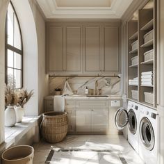 a washer and dryer in a very large room with lots of storage space