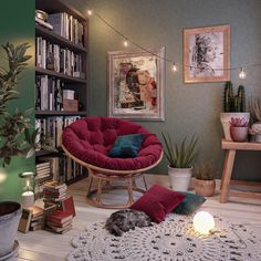 a living room filled with furniture and bookshelves next to a potted plant