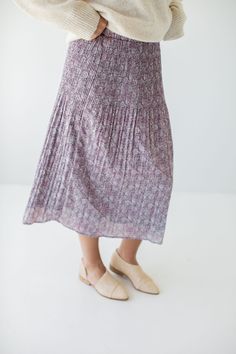 All your purple dreams will come true with the 'Destinee' midi skirt! Featuring a stunning pleated silhouette and a paisley print, this charming skirt is sure to add a touch of flair to any outfit. Pair with a cozy sweater and low ankle boots and a shoulder bag for a colorful yet subtle outfit for the colder weather! 100% Polyester Fully Lined Hand Wash Cold Hang or Lay Flat to Dry Do Not Bleach Cool Iron If Needed FINAL SALE: NOT ELIGIBLE FOR RETURN OR EXCHANGE Model Height 5'7" | Wearing Size Dreams Will Come True, Low Ankle Boots, Layered Tops, Cozy Sweater, Pleated Midi Skirt, Skirt Leggings, Blouse Dress, Cozy Sweaters, Tops For Leggings