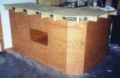 an unfinished kitchen island being built in the middle of a room