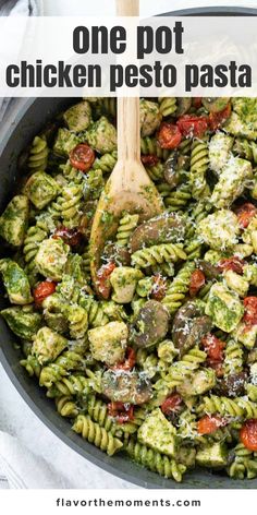 one pot chicken pesto pasta in a skillet with a wooden spoon and text overlay