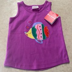 Hannah Andersson Purple Fish Tank Top. Size 100 (Us Size 4). New With Tags, Never Worn. Magenta Purple Tank Top Features Colorful Fish Appliqu And Embroidered Details. Cute Sleeveless T-shirt For Playwear, Sleeveless Cotton Tops For Playtime, Purple Sleeveless Top For Playwear, Sleeveless Purple Tops For Playwear, Casual Multicolor Tops For Play, Playful Purple Cotton Tops, Fun Cotton Tops For Playtime, Multicolor Cotton Tops For Play, Pink Cotton Top For Play