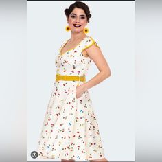 This Is A Voodoo Vixen Ivory Dress With Multicolored Cherries. It Has Flutter Sleeves And Pockets. It Did Have A Yellow Belt But That Is Missing. It Is Brand New With Tags Size Ukxxl/Us 12/14. Beige V-neck Retro Dress, Retro Beige V-neck Dress, Beige Retro Summer Dress, Retro Yellow Cotton Dress, White Retro V-neck Dress, Retro Cream Cotton Dress, Retro Cream Summer Dresses, Summer Retro Cream Dresses, Cream Retro Summer Dress