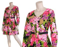 "This 60s era go go dress features a delightful pink floral print, fit-n-flare silhouette, long sleeves, and mini length skirt. Just needs some go go boots to complete the look! Dress is unlined and zips up back. Best fits size small or medium (please check measurements below). Belt not included. Approximate Flat Measurements: Multiply times 2 for bust, waist, and hip measurements. For best fit, compare with a similar style of clothing which you already own. Total Length: 33.75\" Shoulder to Sho Retro Long Sleeve Mini Dress With Floral Print, Mod Long Sleeve Mini Dress For Spring, 1970s Style Mini Dress For Spring, Spring Floral Print Mod Mini Dress, 1970s Long Sleeve Dresses For Spring, 1970s Style Long Sleeve Dresses For Spring, Pink Mod Dress For Spring, 1970s Style Long Sleeve Dresses For Garden Party, 1970s Pink Long Sleeve Dress