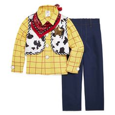 a child's outfit with a cow print on the front and blue pants,