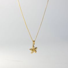 With arms spread wide, it shines so bright. A gold starfish charm necklace, in your sight.  This 14K gold Starfish Pendant features a three-dimensional representation of a starfish, with its arms spread out to create a realistic and detailed look. The intricate patterns on the starfish's surface add texture and depth to this gold starfish necklace. Let your spirit shine with this beautiful and unique nautical pendant. Showcase your love for the seas with sea life jewelry such as this starfish pe Gold Starfish Necklace With Lobster Clasp, Yellow Gold Star Necklaces With Starfish Charm, Yellow Gold Starfish Necklace As Gift, Gold Nautical Jewelry With Star Charm, Ocean-inspired Gold Jewelry With Starfish Charm, Ocean-inspired Gold Jewelry With Star Charm, Gold Star-shaped Charm Necklace With Lobster Clasp, Gold Necklace With Starfish Charm For Gift, Gold Star Charm Necklace With Lobster Clasp