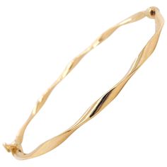 The twisted bangle bracelet is amazing! The details for this gorgeous bracelet are listed below: Bracelet Type: Bangle with Safety Latch Metal Quality: 14 Karat Yellow Gold Circumference: 7.5 inches Diameter: 2.25 x 2.5 inches Width: 2.7 millimeters Clasp: Hidden with Two Safety Latches Weight: 4 grams Oval Bangle, Diamond Cuff Bracelet, Gold Cuff Bracelet, Twisted Bangle, Victorian Gold, Cuff Bangle Bracelet, Gold Bracelet Cuff, Hammered Gold, Gold Cuffs