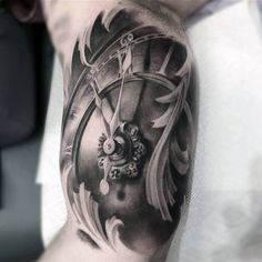 a man with a clock tattoo on his arm