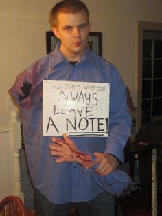 a man in a costume holding a sign that says, and that's why you always leave a note