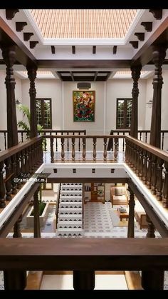 the inside of a building with wooden balconies