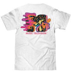 It's Time To Bring Bodacious Back... And yes, we're totally starting with this graphic tee! We've paid tribute to the channel that changed the world with a throwback, 80s art deco inspired t-shirt featuring a subdued MTV logo on the left chest, to a super striking version on the back. To ensure that this retro MTV shirt stands out - we've printed the graphic on a soft, white cotton tee. 100% Cotton Machine Wash Tumble Dry Regular Fit Printed in USA Graphic Tee With Logo For Music Festivals, Graphic Tee With Logo Print For Music Festivals, Retro T-shirt With Text Print For Music Festivals, White T-shirt With Text Print For Music Festivals, White Text Print T-shirt For Music Festivals, 90s Inspired White Graphic T-shirt, Pop Culture T-shirt For Music Festivals, 90s Inspired Graphic Print T-shirt For Fans, White Graphic Tee For Music Festival