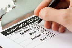 a person filling out a customer service form