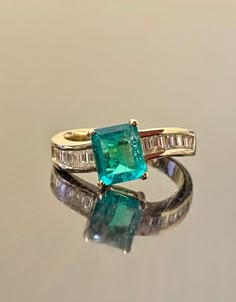 DeKara Designs Clearance Handmade Art Deco Colombian Emerald and Diamond Ring. This ring was entirely handmade by my father in the 1980's, anyone lucky enough to buy this ring will truly appreciate the workmanship and the beauty of this piece of art. Metal- 14K Yellow Gold, .583 Stones- 1 Emerald Cut Genuine Colombian Emerald 1.15 Carats, 12 Baguette Diamonds G-H Color VS2 Clarity 0.52 Carats. Size- 6 1/4. FREE SIZING Handmade in 14K Yellow Gold Amazing Emerald Cut Colombian Emerald and Baguette Emerald Ring Design, Colombian Emerald Ring, Engagement Ring Emerald Cut, Gold Emerald Ring, Wedding Ring Gold, Art Deco Emerald Ring, Engagement Ring Emerald, Emerald And Diamond Ring, Ring Emerald Cut