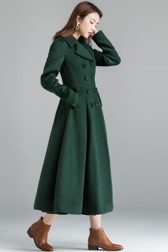 "Vintage inspired but modern wool maxi coat that will keep you warm and stylish this winter, Excellent high-quality winter outwear that don't cost a fortune. DETAIL * Excellent high-quality, medium weight, warm wool fabric * (50% wool, 50% fiber,nylon, etc. ) * Matching satiny lining. * Double breasted, Button closure * Calf length * Fit and flare Silhouette * Two side seam pockets * Fit for autumn-to-winter * A really beautiful coat if you love the vintage look. True craftsmanship. * The skirt Green Long Wool Winter Coat, Green Wool Coat For Winter, Green Long Wool Coat For Winter, Winter Wool Coat For Office, Chic Green Wool Coat For Winter, Elegant Green Stand Collar Outerwear, Elegant Green Outerwear With Stand Collar, Chic Long Green Wool Coat, Chic Green Long Wool Coat