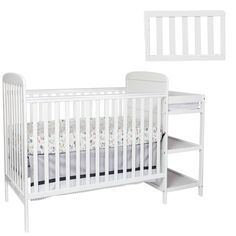 a white crib and changing table in front of a white background with the baby's bed next to it