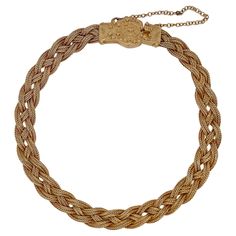 A very fine 14k gold Etruscan style bracelet. With three delicate strands of woven braided gold wire terminating in an Etruscan style box clasp with granulated and wire work decoration. Set with a safety chain. Simply a finely-made Etruscan style bracelet! Date: 20th Century Overall Condition: It is in overall good, as-pictured, used estate condition with some very fine & light surface scratches and other signs of expected light wear consistent with age. Fineness: Marked 14k for gold fineness. M Gold Woven Bracelet, Yellow Gold Cuff Bracelet, Amulet Bracelet, Retro Bracelet, Gold Link Chain, Style Box, Wide Bracelet, Diamond Brooch, Gold Bracelet Cuff