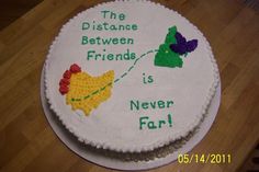 a cake that has been decorated with the words, distance between friends is never far