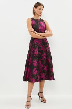 Nodding to a vintage aesthetic, this ladylike dress blooms with vibrant flowers and features a softly structured jacquard finish. The elegant round neckline offsets a nipped-in waist and full skirt, further adding to the romantic, retro-chic vibe. Anchor the busy floral motif with strappy heels and minimal jewellery.Style: Fit & Flare DressFabric: JacquardLength: MaxiNeckline: CrewSleeve Length: Sleeveless Ladylike Dress, Minimal Jewellery, Full Skirt Dress, Vibrant Flowers, Pink Midi Dress, Retro Chic, Fit N Flare Dress, Vintage Aesthetic, Full Skirt