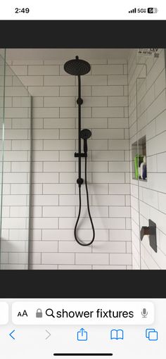 an image of a shower head and hand held shower faucet in the bathroom