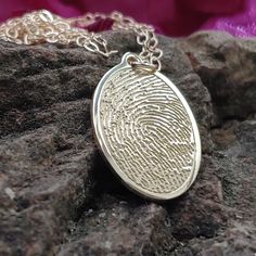 "Free first class shipping on all items with standard gift box! Free priority shipping on orders over $140 with upgraded gift box! U.S. shipments only These are very high detailed copied fingerprint pendants deeply cut into SOLID 10k yellow gold. These come standard mounted on a free 18 inch gold filled chain. You will not find a higher quality memorial item than my items, plus these ship much faster and at a fraction of the price you will find offered from funeral homes. Optional is a 18 inch l Stamped Oval Pendant Jewelry Gift, Oval Pendant Jewelry For Gifts, Elegant Laser Engraved Necklaces For Keepsake, Elegant Laser Engraved Pendant Jewelry, Elegant Stamped Jewelry For Memorial, Keepsake Gold Stamped Jewelry, Oval Yellow Gold Stamped Jewelry, Elegant Yellow Gold Necklace With Laser Engraving, Elegant Yellow Gold Laser Engraved Necklace