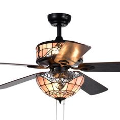 a ceiling fan with two lights and a stained glass shade on the top of it