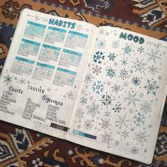 an open planner with snowflakes on it and the words, habitts mood