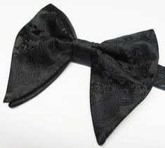 Beautiful pre-tied and adjustable double tiered banded bow tie Velvet Will adjust from 13" through 20" neck. Bow dimensions 3.25" x 4.5". Bow tie Always made by hand and to your special order. Weddings and groups are welcome. Black Bow Tie With Butterfly Knot For Business, Black Butterfly Knot Bow Tie For Business, Elegant Black Ties With Butterfly Knot, Elegant Black Tie With Butterfly Knot, Classic Black Bow For Gift, Adjustable Bow For Formal Occasions, Black Adjustable Bow For Formal Occasions, Adjustable Black Bow For Formal Occasions, Formal Black Adjustable Bow