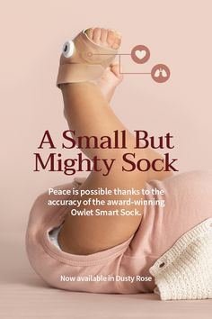 a small baby laying on its back with the caption'a small but mighty sock peace is possible thanks to the accrucy of the award winning owllet smart sock