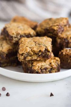 oatmeal chocolate chip cookie bars on a white plate with text overlay