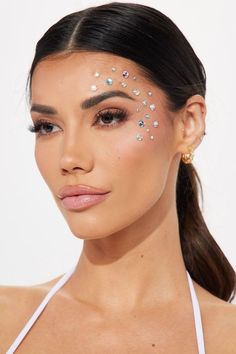 DIDI BEAUTY BRAND|#gorgeouswomen #beautyfacewomen #beautifulwomen #cuteselfieideas #prettyselfie #selfieideas Gems For Face, Mermaid Face Jewels, Rhinestone Face Art, Face Rhinestones Simple, Pride Face Gems, Rhinestone Face Design, Gem Face Designs, Righnstone Makeup, Face Rhinestone Ideas