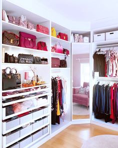 the closet is full of handbags, purses and other things to wear in it