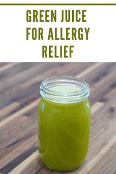 green juice for allergy relief is in a jar on a wooden table with text overlay that reads, green juice for allergy relief