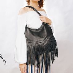 Have you always dreamed of a magnificent Boho bag with fringes that dance with your every movement? Dear, you're going to love our Wild Boho Dancing Fringe Shoulder Bag – simply a must-have Boho fringe bag that will be an eye-catcher wherever you go! Crafted from a gorgeous soft lamb leather with rich hues, this stunning Boho fringe bag features an exquisite detailed handwoven design, with stylish braided straps and amazing long fringes for a chic and whimsical Wild Boho style! ~ We absolutely l Travel Fringe Hobo Shoulder Bag, Travel Hobo Shoulder Bag With Fringe, Fringe Hobo Shoulder Bag For Everyday Use, Everyday Use Bag With Fringe, Black Tasseled Hobo Bag, Black Fringe Hobo Bag For Daily Use, Black Hobo Bag With Fringe For Daily Use, Daily Use Hobo Bag With Fringe, Black Fringe Hobo Bag For Everyday