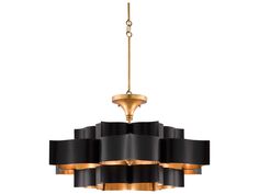 a black and gold chandelier hanging from the ceiling