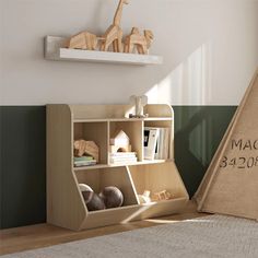 a child's book shelf with wooden toys on it