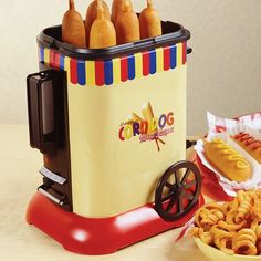 there is a hot dog maker and some pretzels on the table