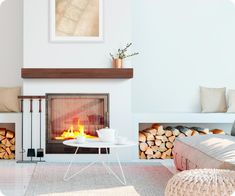 a living room filled with furniture and a fire place in front of a wall mounted fireplace