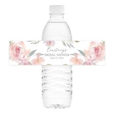 a water bottle label with pink flowers on it