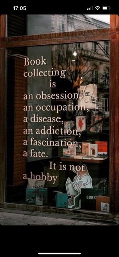 a book store window with an advertisement on it's front and the words, book collecting is an obsesion