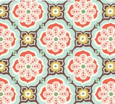 an orange and blue flower pattern on a brown background with green, pink, yellow and white flowers