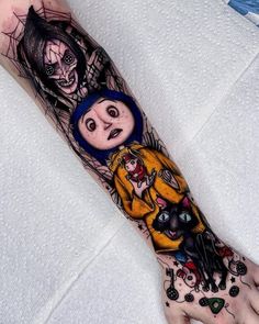 a person with a tattoo on their arm that has an image of two people in the background